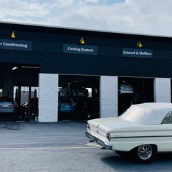 Meineke Car Care Center - Their service garage doors in working progress