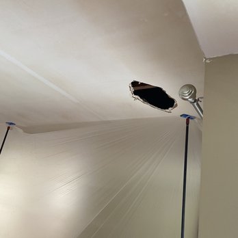 Attic Guys - Hole in living room - Pest Control Near Me - Anaheim, California Attic Guys - Hole in living room - Pest Control Near Me - Anaheim, California
