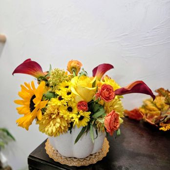 Perfect Harmony Floral - Fall pumpkin floral arrangement calla lilies, sunflowers, and roses - Florists Near Me - Belgrade, Montana