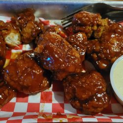 Boomtown Saloon - BBQ boneless wings with white BBQ sauce side
