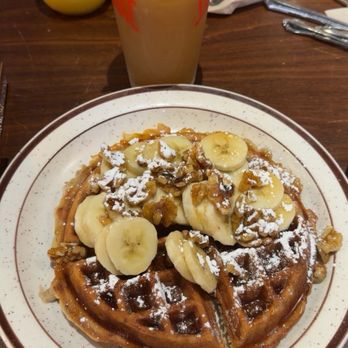 Funk 'n Waffles - This was the earth wind n fire made as a banana waffle with walnuts, banana, honey and powdered sugar. - New American Near Me - Syracuse, New York Funk 'n Waffles - This was the earth wind n fire made as a banana waffle with walnuts, banana, honey and powdered sugar. - New American Near Me - Syracuse, New York