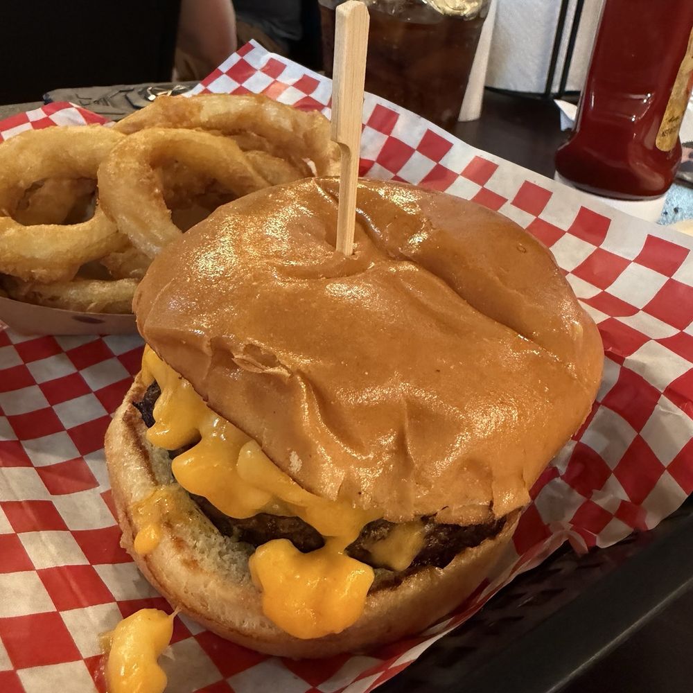 Riverwatch Bar & Grill - Mac & Cheese Burger with O rings - Bars Near Me - Chimney Rock, North Carolina Riverwatch Bar & Grill - Mac & Cheese Burger with O rings - Bars Near Me - Chimney Rock, North Carolina