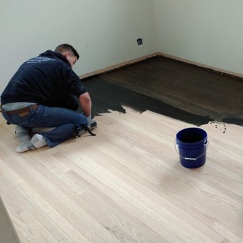 Classic Floorcovering - Applying the stain to this floor is a hands on project! - Flooring Near Me - Henderson, Nevada Classic Floorcovering - Applying the stain to this floor is a hands on project! - Flooring Near Me - Henderson, Nevada