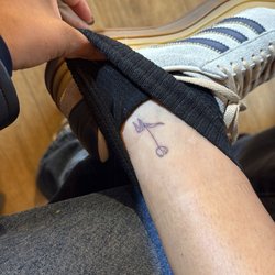 Ink Your Skin - Tulip ankle tattoo