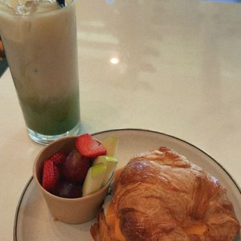 Manna Bread from Heaven - oatmilk matcha latte, breakfast sandwich on a Croissant with sausage, egg, & cheese - Bakeries Near Me - Tomball, Texas Manna Bread from Heaven - oatmilk matcha latte, breakfast sandwich on a Croissant with sausage, egg, & cheese - Bakeries Near Me - Tomball, Texas