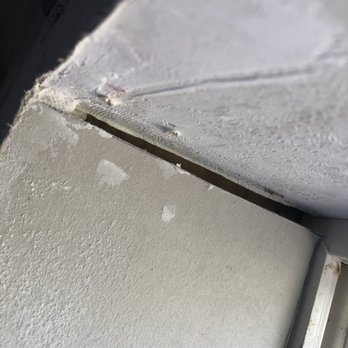 Two Roccos - More incomplete drywall around the window - Mobile Home Repair Near Me