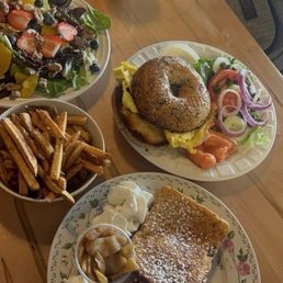 The Goldie Lox, French toast with apples, and the strawberry Fields salad with a side of french fries. The Goldie Lox, French toast with apples, and the strawberry Fields salad with a side of french fries.