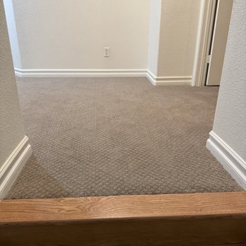 DEL Flooring - Custom hardwood integration to new carpeting - Flooring Near Me