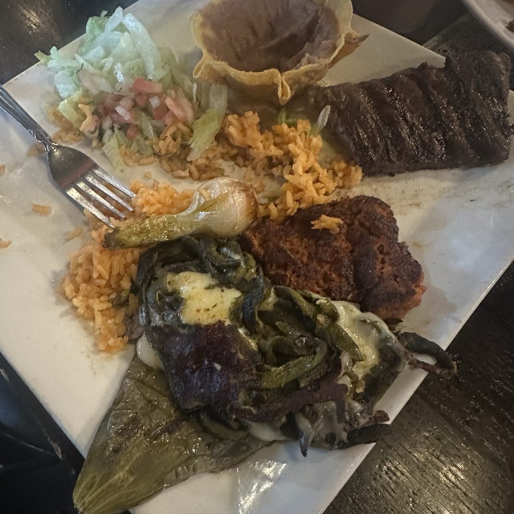 It's not the steak I ordered. I asked for a steak on a hot plate with melted cheese on it. That's on the menu and it was cold. It's not the steak I ordered. I asked for a steak on a hot plate with melted cheese on it. That's on the menu and it was cold.