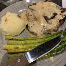 Pork steak with Marsala mushroom gravy and two sides