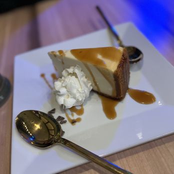 Konoko Restaurant - Cheesecake with rum drizzle - Caribbean Near Me - White Marsh, Maryland Konoko Restaurant - Cheesecake with rum drizzle - Caribbean Near Me - White Marsh, Maryland