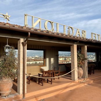 B Roof - View of the hotel sign from the B Roof Restaurant and Bar on the rooftop of the Grand Hotel Baglioni - Tuscan Near Me - Florence, FI B Roof - View of the hotel sign from the B Roof Restaurant and Bar on the rooftop of the Grand Hotel Baglioni - Tuscan Near Me - Florence, FI