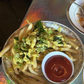 Oma's Hideaway - salted egg curry fries - Asian Fusion Near Me - Portland, Oregon Oma's Hideaway - salted egg curry fries - Asian Fusion Near Me - Portland, Oregon