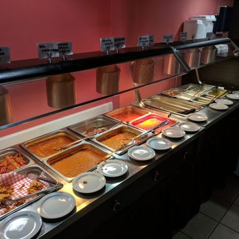 Gate of India - They buffet had a nice selection ranging from veggie dishes to standard like Chicken Tikka Masala and Goat Curry. Nan brought to the table - Indian Near Me - Calgary, Alberta