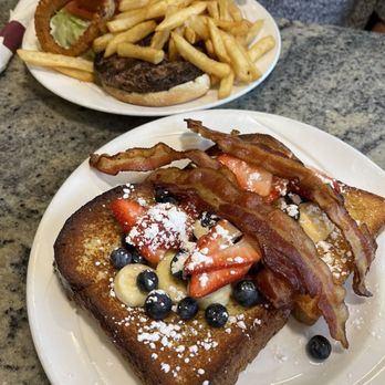 Old Westbury Diner - Homemade Challah French Toast with Berries and bananas. Hamburg Deluxe - Diners Near Me - Old Westbury, New York Old Westbury Diner - Homemade Challah French Toast with Berries and bananas. Hamburg Deluxe - Diners Near Me - Old Westbury, New York