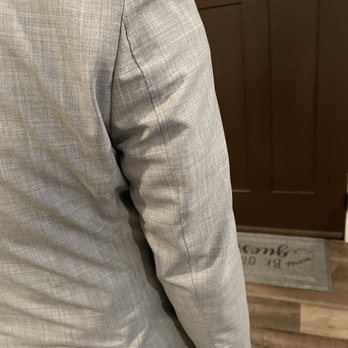 Perez Tailor - Sleeves not aligned. Back of the coat has wrinkles on the right side. - Sewing & Alterations Near Me - Downey, California Perez Tailor - Sleeves not aligned. Back of the coat has wrinkles on the right side. - Sewing & Alterations Near Me - Downey, California