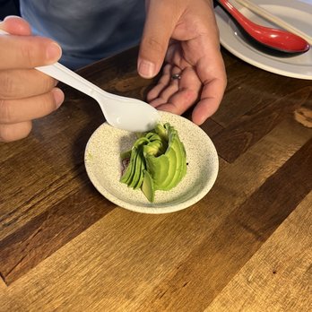 Sushi Dabu - The nicely sliced avocado the waitress brought for our baby :0] so kind! - Sushi Bars Near Me - Ypsilanti, Michigan