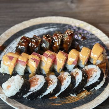 Yoi Tomo - Salmon Roll (front), Pretty Woman Roll (middle), Black Panther Roll (back) - Japanese Near Me - Boise, Idaho