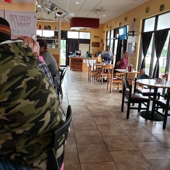 Rick's Diner - a man sitting at a table - Diners Near Me - Port St Lucie, Florida Rick's Diner - a man sitting at a table - Diners Near Me - Port St Lucie, Florida