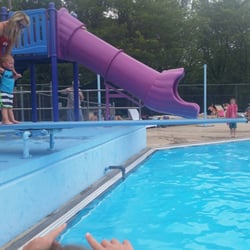Downers Grove Swim & Racquet Club - Diving board and slide. Trying to jump off the diving board.