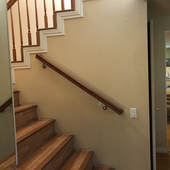 Contour Stairs - After - solidly installed into the studs (which apparently are under a layer of cement!) - General Contractors Near Me