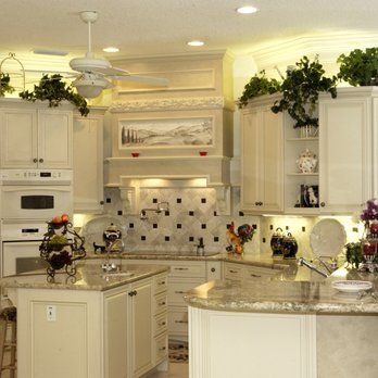 Luxury Builders - a large kitchen with a center island - General Contractors Near Me - Daytona Beach, Florida Luxury Builders - a large kitchen with a center island - General Contractors Near Me - Daytona Beach, Florida