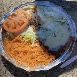 El Rincon Mexican Restaurant - Mexico Special.  Delicious shredded chicken filled burritos with cheese sauce and sour cream. Highly recommend!