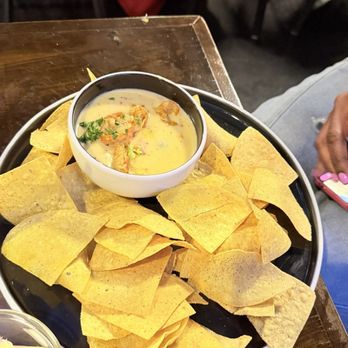 Quad Sports Bar & Restaurant - Crawfish queso dip with tortillas - Sports Bars Near Me - Houston, Texas Quad Sports Bar & Restaurant - Crawfish queso dip with tortillas - Sports Bars Near Me - Houston, Texas