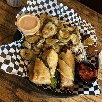Mugshots Grill & Bar - a plate of food - Burgers Near Me - Meridian, Mississippi