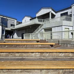 Cannery Row - Boardwalk with seats outside the aquarium