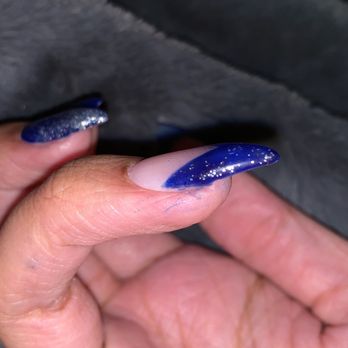 Estelle Nail Spa - Sides not painted all the way on both sides of two nails. - Nail Salons Near Me - Temple, Texas