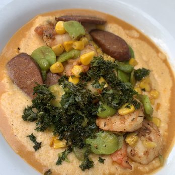 Cafe Orleans - Shrimp and Grits Creole Shrimp served atop Cheese Grits, Spiced Sausage, Fava Bean-Corn Relish, and Shrimp Sauce $23.00 - Cajun/Creole Near Me - Anaheim, California