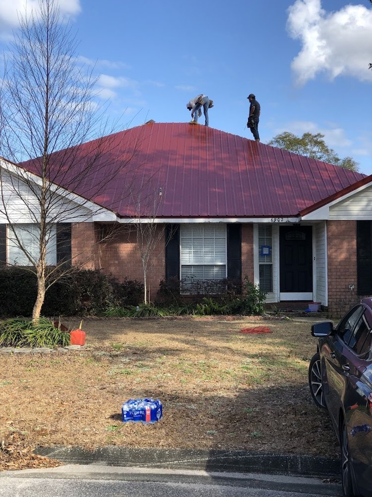 Slide of H.E. Roberts Roofing