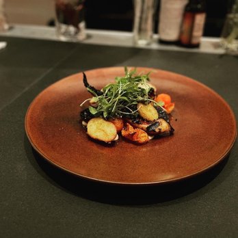 Gordon Ramsay Hell's Kitchen - GRILLED OCTOPUS- white bean purée, pee wee potatoes, roasted tomatoes, chili oil, chimichurri. 7/10 was overcooked but flavors were good - Desserts Near Me - Washington, DC, District of Columbia
