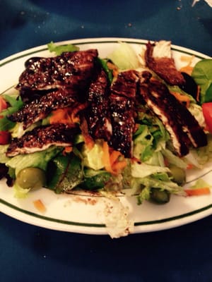 Photo of Gallery IV Italian Restaurant - Lynbrook, NY, US. Balsamic chicken over a salad
