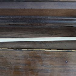 Perfect re-hair job on the bow.