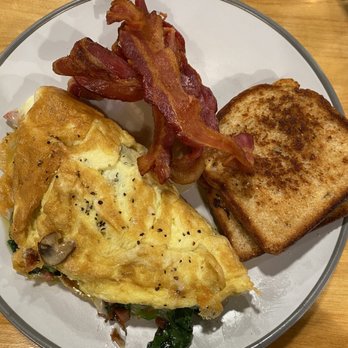 Ainsley’s place - Everything omelette with bacon and toast. Only $11 for this huge breakfast!! - Breakfast & Brunch Near Me - Hermann, Missouri Ainsley’s place - Everything omelette with bacon and toast. Only $11 for this huge breakfast!! - Breakfast & Brunch Near Me - Hermann, Missouri
