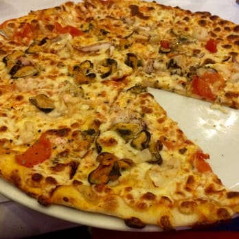 Giovanni - Seafood pizza - light thin base. Very tasty. - Pizza Near Me - Paris, 75 Giovanni - Seafood pizza - light thin base. Very tasty. - Pizza Near Me - Paris, 75