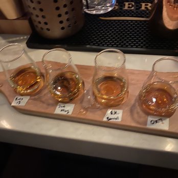 Whiskeys - 4 pour flight of Russell's 13, Joseph Magnus Cigar Blend, EHTBP Batch 9, and OKI. - Whiskey Bars Near Me - Dallas, Texas Whiskeys - 4 pour flight of Russell's 13, Joseph Magnus Cigar Blend, EHTBP Batch 9, and OKI. - Whiskey Bars Near Me - Dallas, Texas