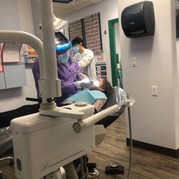 My daughter watching a Disney movie while being treated for a clean up. My daughter watching a Disney movie while being treated for a clean up.