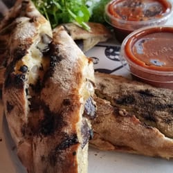 Mushroom, chevre and arugula stromboli