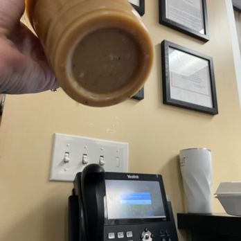 Toasty's Breakfast Burritos - a hand holding a coffee cup - Breakfast & Brunch Near Me - Oakland, California