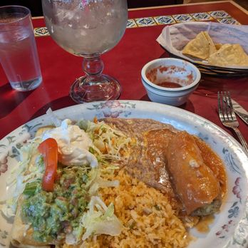 Fiesta Jalisco - Large combo featuring a chicken chimichanga with guacamole sour cream and a small chili relleno, served with rice and beans. - Mexican Near Me - Steamboat Springs, Colorado Fiesta Jalisco - Large combo featuring a chicken chimichanga with guacamole sour cream and a small chili relleno, served with rice and beans. - Mexican Near Me - Steamboat Springs, Colorado