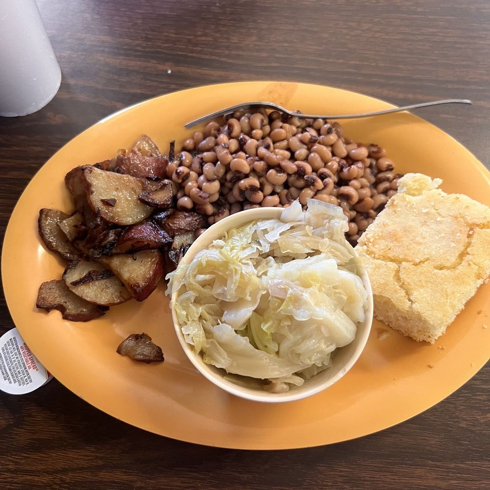 Vegetable plate - black eyed peas, fried potatoes, cabbage and cornbread Vegetable plate - black eyed peas, fried potatoes, cabbage and cornbread