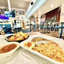 La Fiesta On Main - A fresh chicken enchilada with rice and beans combined with my spicy salsa? My favorite combo and really cannot go wrong!
