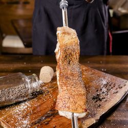 Rodizio Grill - Mesa - Flavorful, peppered pork belly, a Bacon Fest special