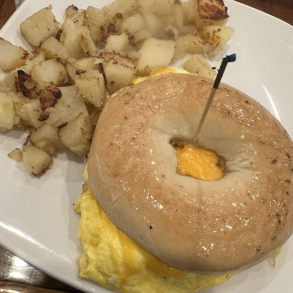 Beach Shanty Cafe - Egg and cheese bagel and home fries - Breakfast & Brunch Near Me - Clearwater, Florida