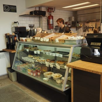 Ascenseur du Faubourg - a woman behind the counter - Sandwiches Near Me - Quebec City, Quebec Ascenseur du Faubourg - a woman behind the counter - Sandwiches Near Me - Quebec City, Quebec