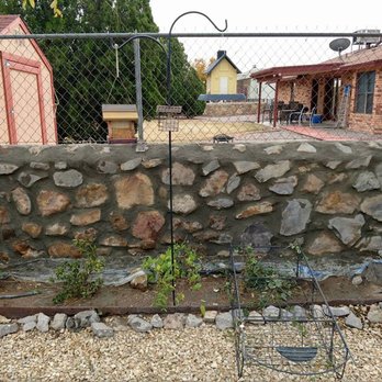 Schroder Construction - a garden with a stone wall - General Contractors Near Me - Las Cruces, New Mexico Schroder Construction - a garden with a stone wall - General Contractors Near Me - Las Cruces, New Mexico