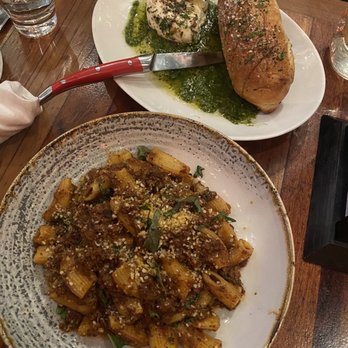 Von's 1000Spirits - Signature Spicy Bolognese with Our Sourdough Pasta - New American Near Me - Seattle, Washington